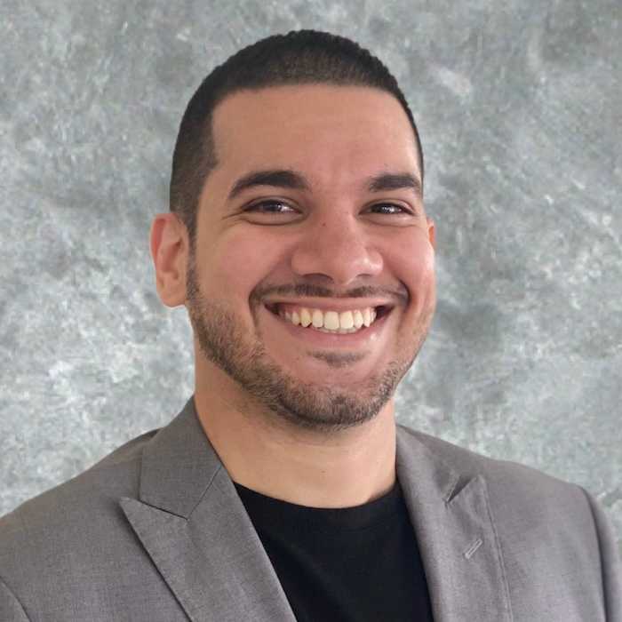 Reza Taghiof's headshot
